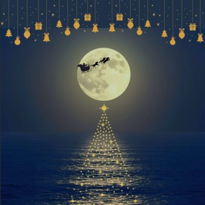 夜に駆け抜ける馬ぞりに乗ったサンタ